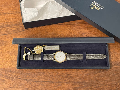 (1994) Seiko 7N00-S007 "Gold" 18K gold collection dress watch - 18k solid gold case - white dial w/ gold markers