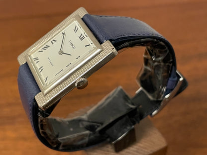 (1970s) Tissot Stylist "Tank" - decorated case - white dial w/ black Roman numerals (NOS)