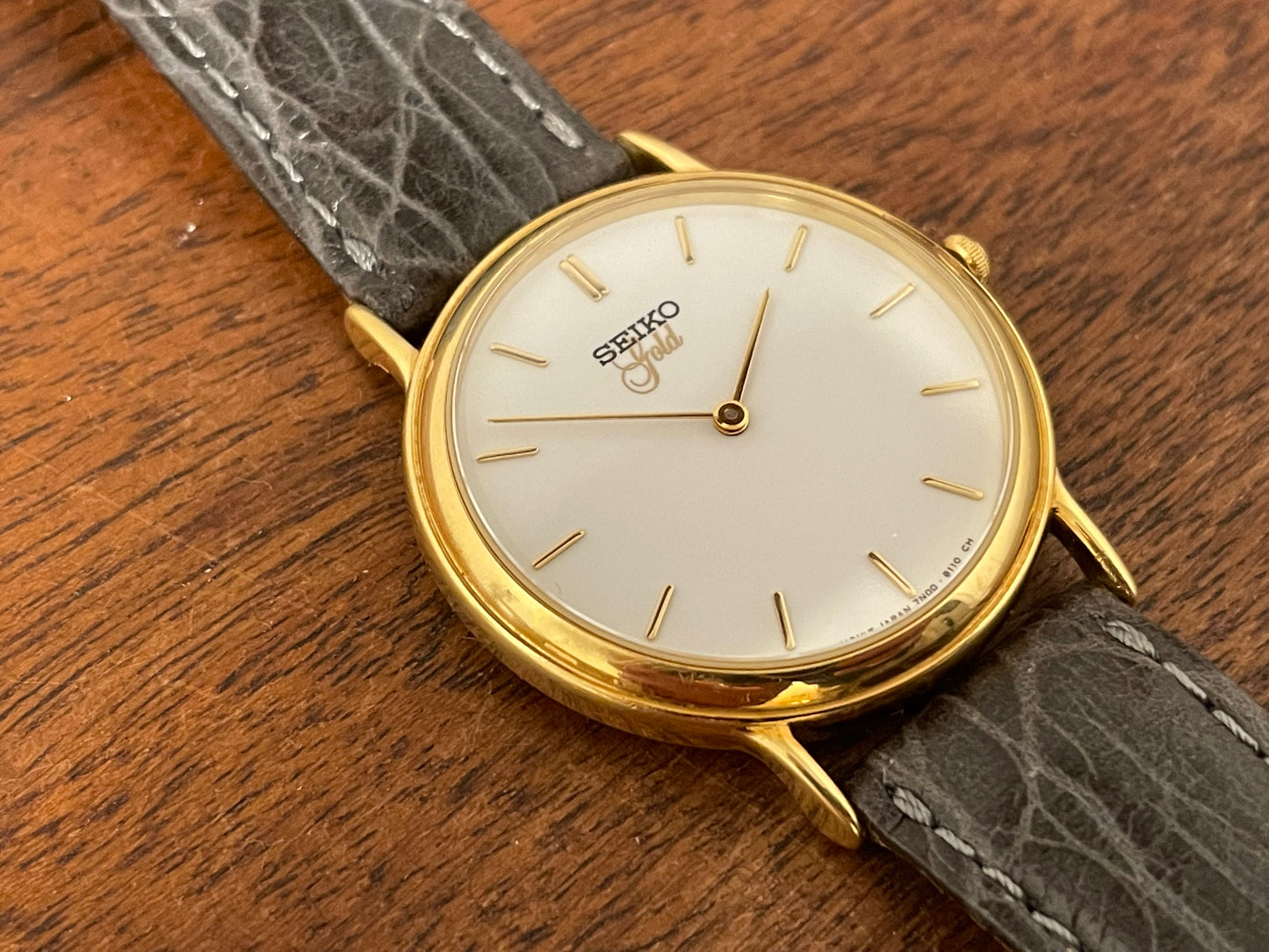 (1994) Seiko 7N00-S007 "Gold" 18K gold collection dress watch - 18k solid gold case - white dial w/ gold markers