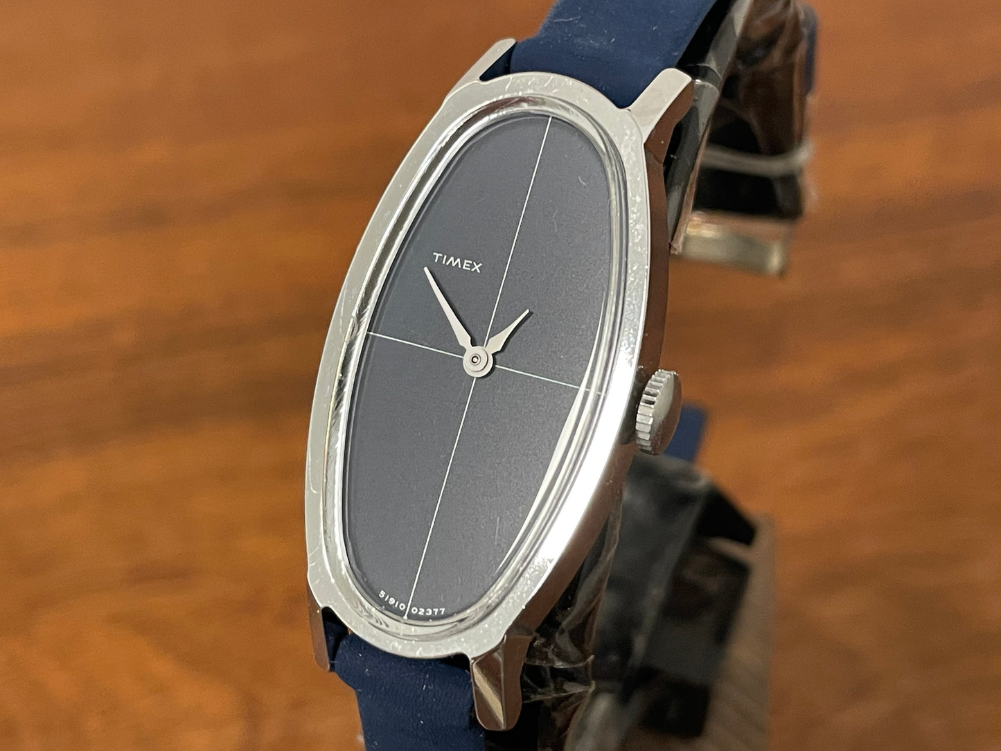 (1970s) Timex 519-105 dress watch - elongated oval case - black cross dial - small size (NOS + full set)