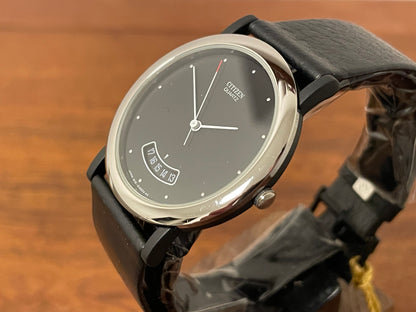(1989) Citizen QD9022-05E dress watch - black lugs - black dial w/ arc date window (NOS)