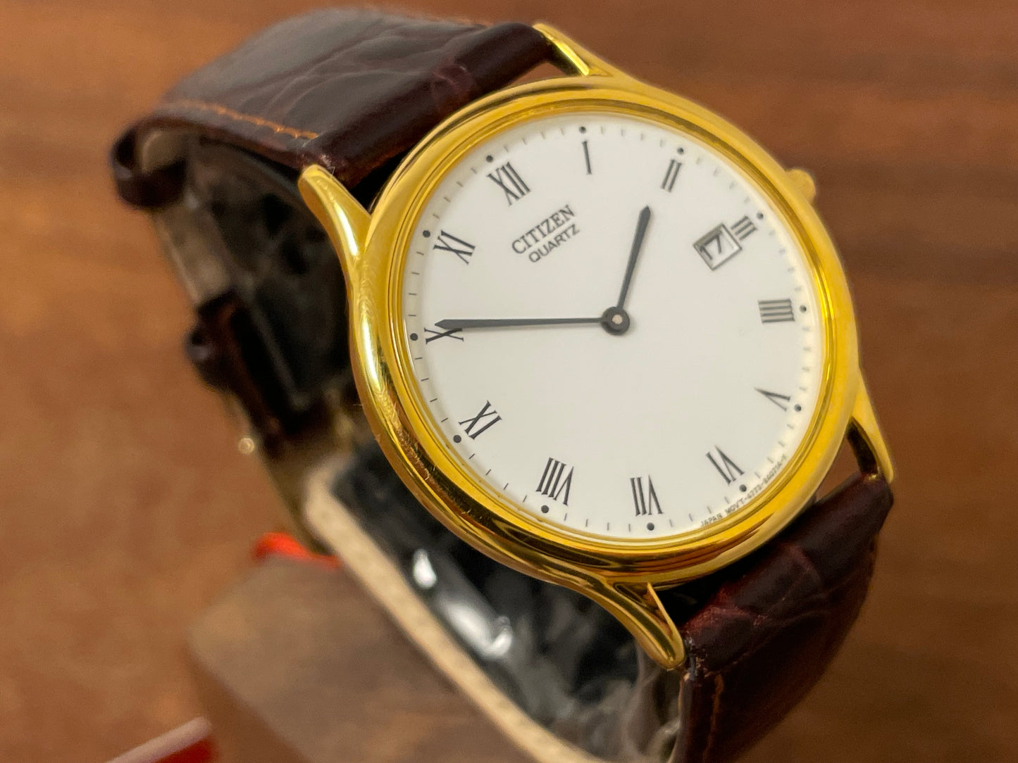 (1995) Citizen QF0838-05A Ore Felici dress watch - white dial w/ black Roman numerals (NOS)