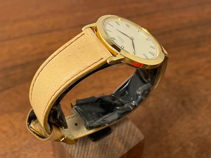 (1989) Seiko 5Y94-8000 dress watch - gold case - cream dial w/ black Roman numerals (NOS)