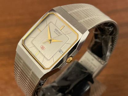 (1985) 5Y02-5010 Seiko 5 quartz - integrated bracelet - silver brushed dial w/ stick markers (mint)