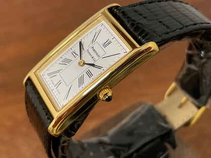 (1998) Tiffany & Co. Portfolio "Tank" dress watch - gold case - white dial w/ black Roman numerals (Mint)