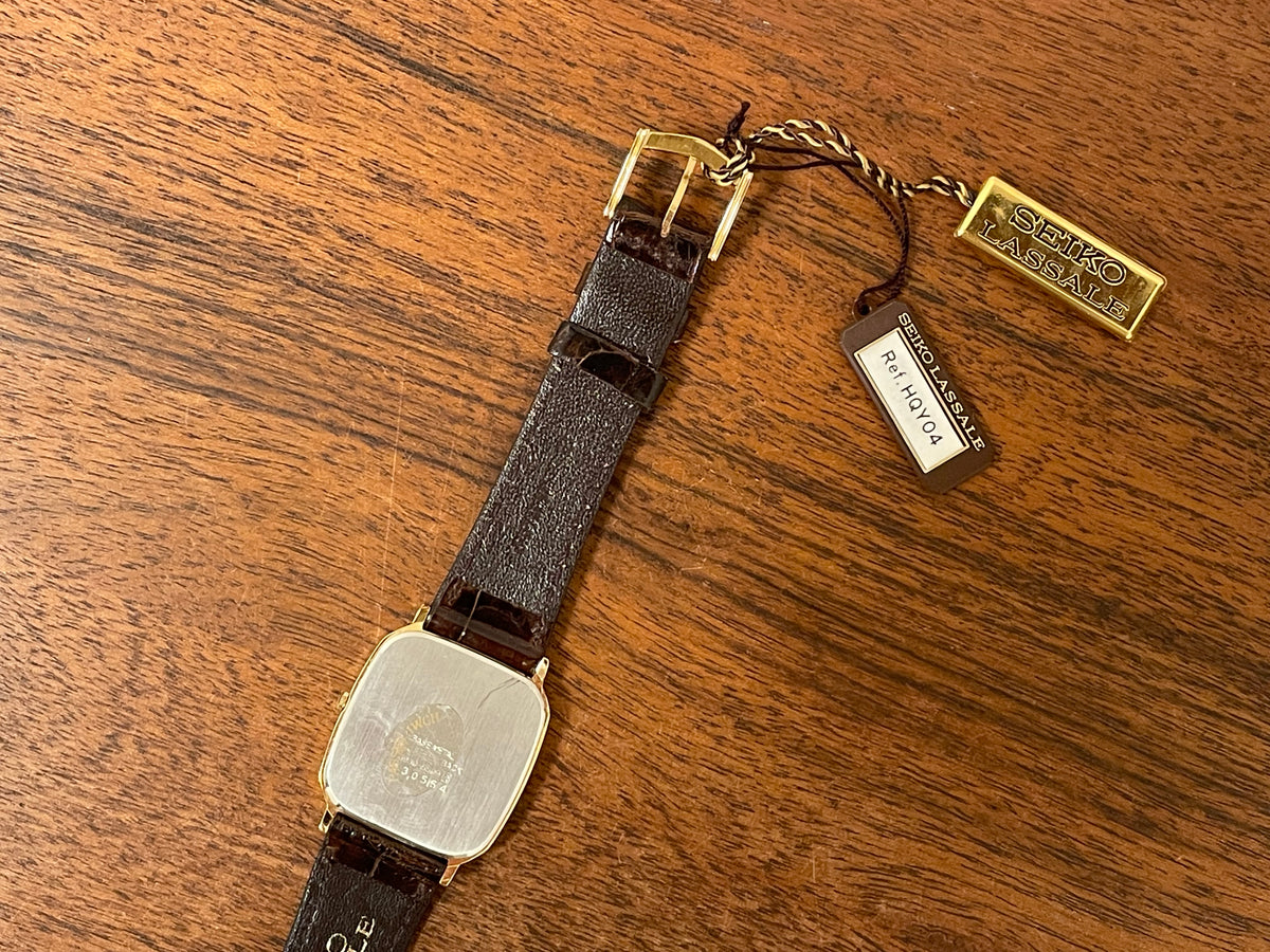 (1981) Seiko 5930-5509 Lassale dress watch - gold textured dial w/ gold stick markers (NOS)