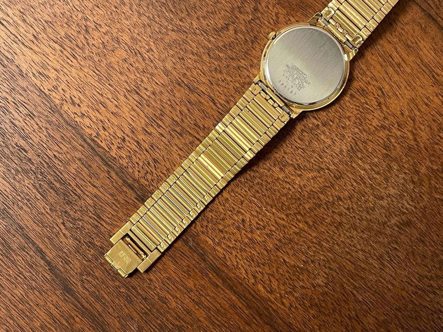 (1992) Seiko 5Y89-7A10 dress watch – white dial w/ Roman numerals & date (NOS)