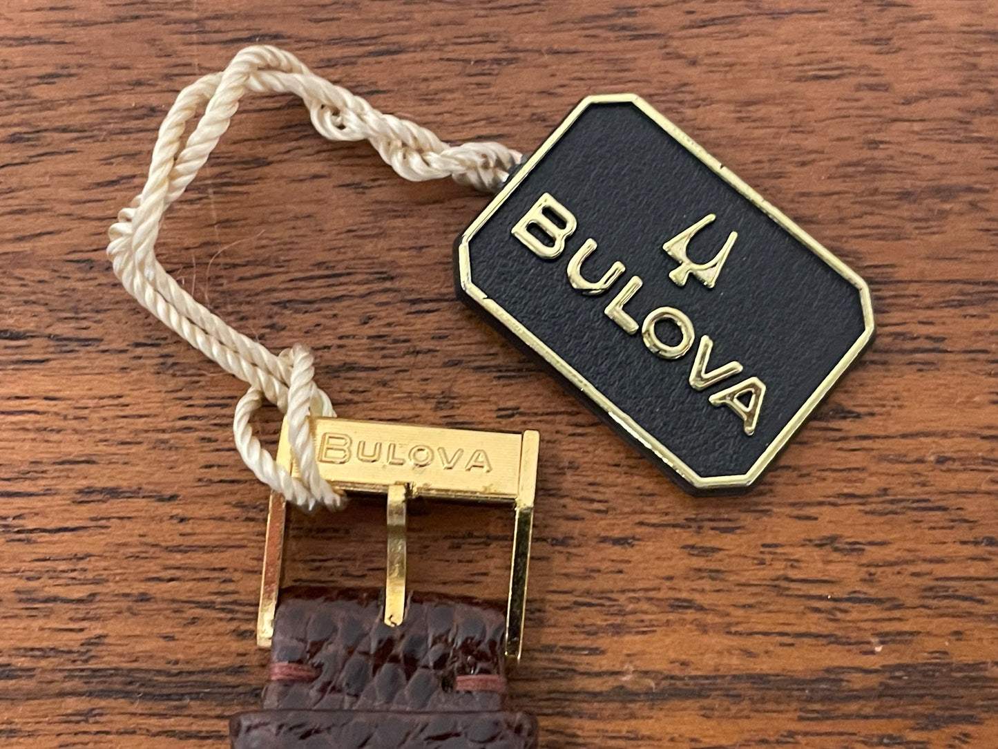 (1982) Bulova Longchamp "Tank" dress watch - gold case w/ champagne dial - small size (NOS)