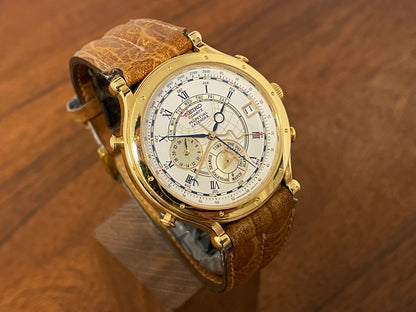 (1994) Seiko 6m13-0010 Age of Discovery (AOD) Perpetual Calendar - gold colored case - white dial w/ black Roman numerals