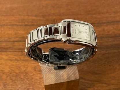 (1999) Seiko 7N01-0FW0  - "Tank" style case - silver dial w/ silver Roman numerals - small size (NOS)