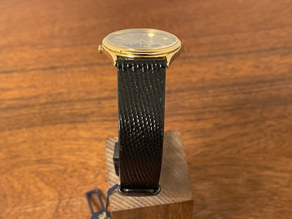 (1986) Seiko 7434-7000 dress watch with moon phase -silver dial w/ gold stick markers (NOS)