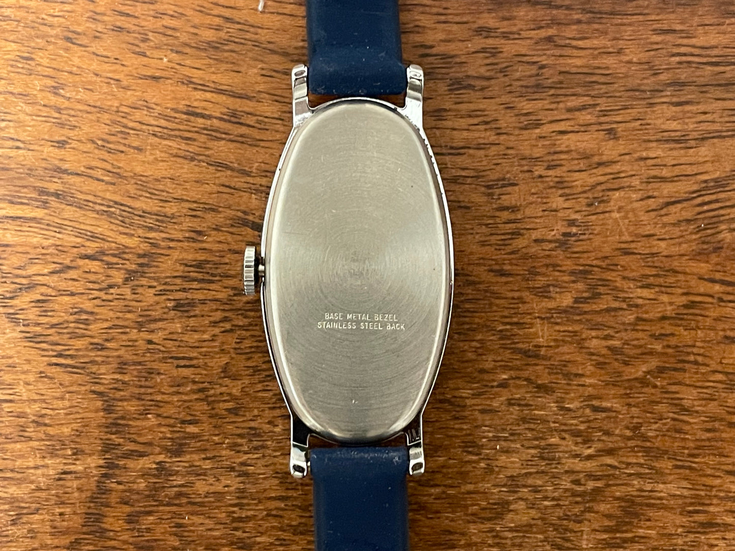(1970s) Timex 519-105 dress watch - elongated oval case - black cross dial - small size (NOS + full set)