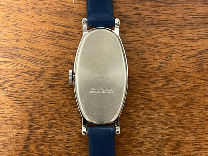 (1970s) Timex 519-105 dress watch - elongated oval case - black cross dial - small size (NOS + full set)
