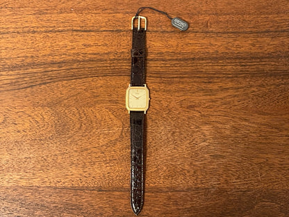 (1987) Seiko 5E20-5A00 "Tank" dress watch - champagne patterned dial w/ gold markers (NOS)