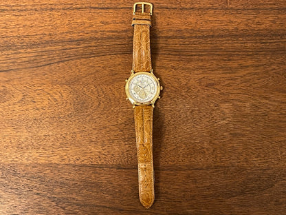 (1994) Seiko 6m13-0010 Age of Discovery (AOD) Perpetual Calendar - gold colored case - white dial w/ black Roman numerals