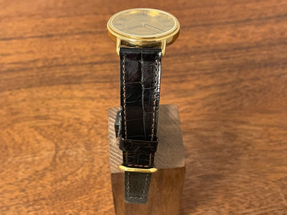 (1970s) Tissot 40771 Stylist dress watch - gold case - brushed gold dial w/ black Roman numerals (NOS)
