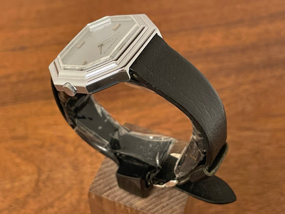 (1974) Caravelle dress watch - octagon case - brushed silver dial w/ stick markers (mint)