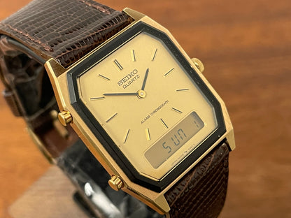 (1984) Seiko H448-5130 Alarm Chronograph - gold dial w/ gold markers & digital display