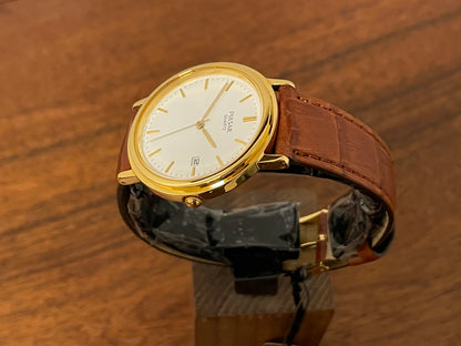 (2003) Pulsar V532-8B40 dress watch - gold colored case - white dial w/ gold markers (NOS)