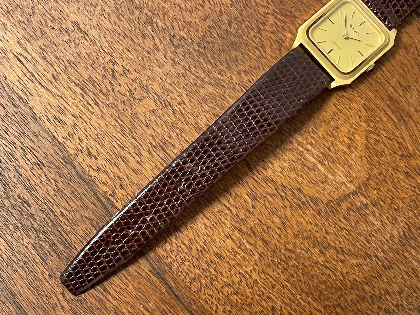 (1982) Bulova Longchamp "Tank" dress watch - gold case w/ champagne dial - small size (NOS)