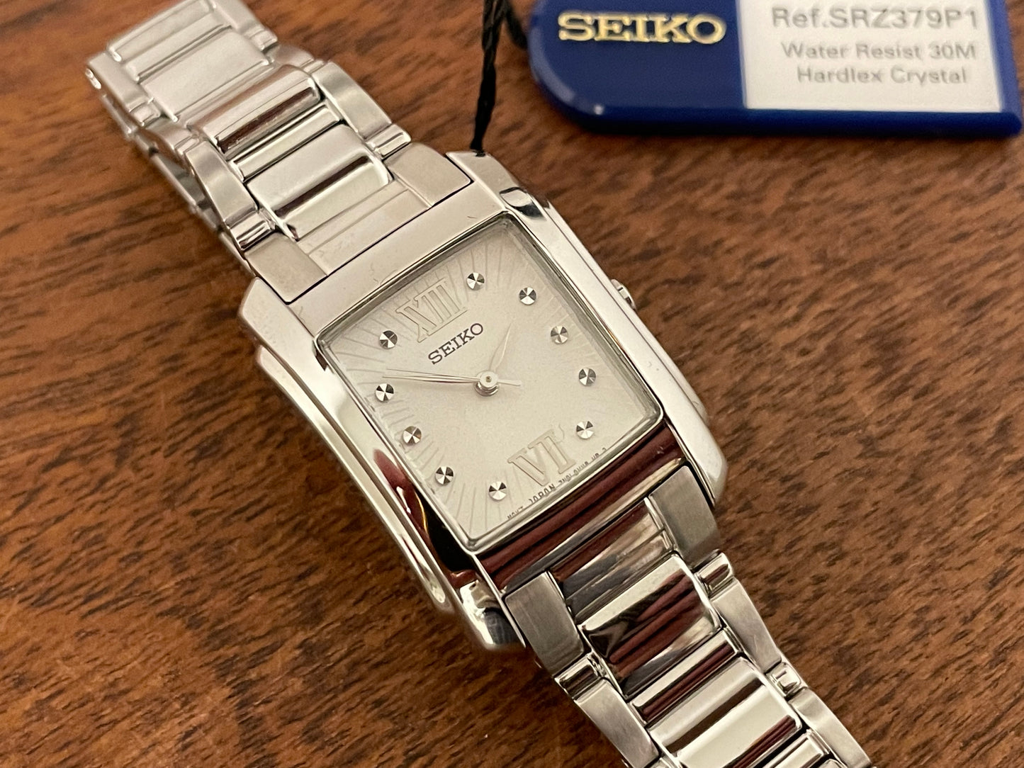 (1999) Seiko 7N01-0FW0  - "Tank" style case - silver dial w/ silver Roman numerals - small size (NOS)
