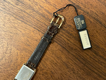 (1983) Seiko 7320-5500 "Tank" dress watch - gold dial w/ gold markers - small size (NOS)