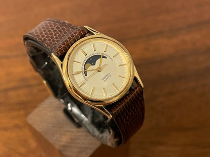 (1985) Seiko 2A24-0040 dress watch - champagne dial w/ moonphase & stick markers - small size (NOS)