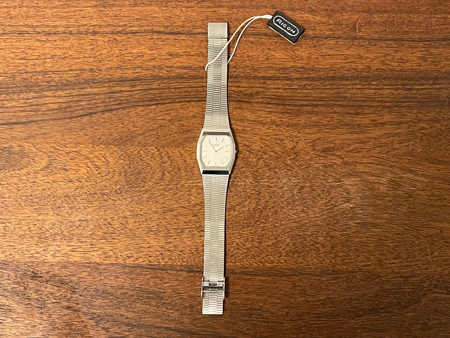 (1977) Ricoh 702008SS dress watch - silver brushed dial w/ silver markers (NOS)