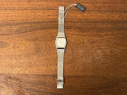 (1977) Ricoh 702008SS dress watch - silver brushed dial w/ silver markers (NOS)