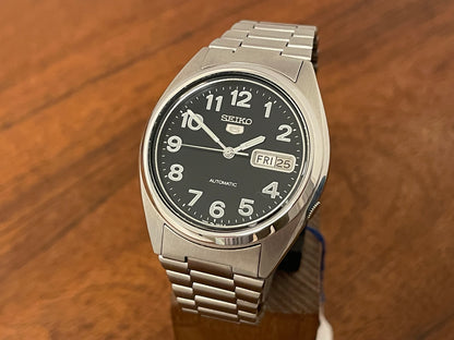 Front side (1996) Seiko 5 automatic 7009-3180 - black dial w/ military style numerals (NOS)