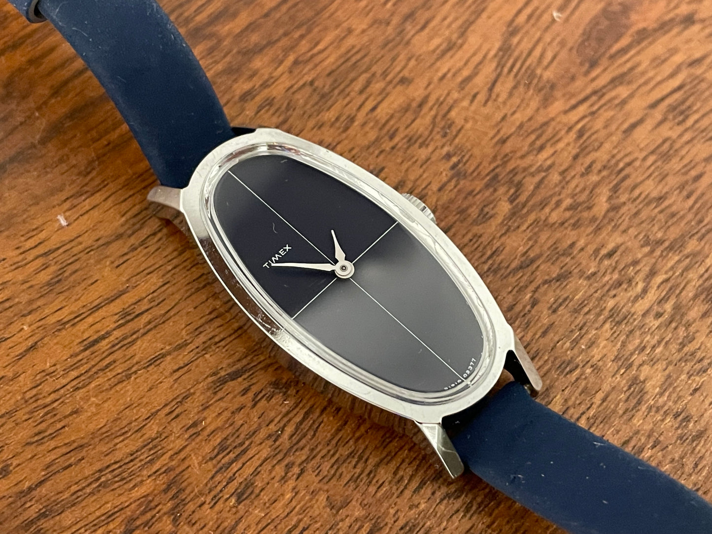 (1970s) Timex 519-105 dress watch - elongated oval case - black cross dial - small size (NOS + full set)
