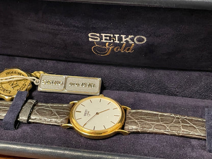 (1994) Seiko 7N00-S007 "Gold" 18K gold collection dress watch - 18k solid gold case - white dial w/ gold markers