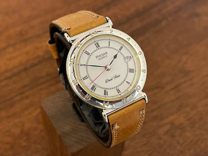 (1988) Pulsar V339-6000 GMT  “Dual Time” dress watch - white dial w/ Roman numerals (NOS)