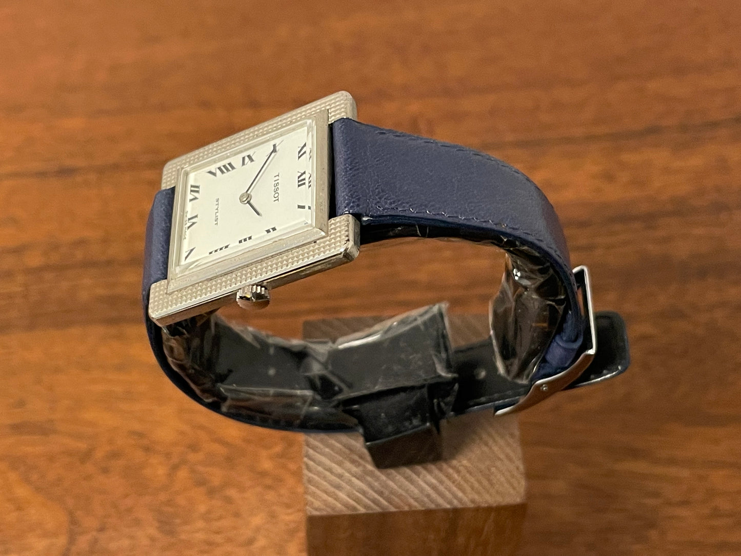 (1970s) Tissot Stylist "Tank" - decorated case - white dial w/ black Roman numerals (NOS)