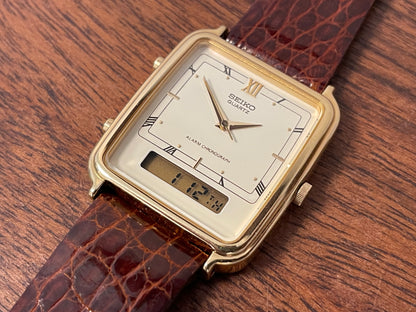(1985) Seiko H601-5010 Alarm Chronograph - cream dial w/ gold Roman numerals (mint)