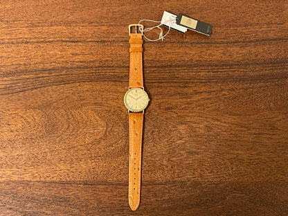 (1977) Seiko 43-0150 14K solid gold dress watch - rope bezel -  gold textured dial w/ gold markers