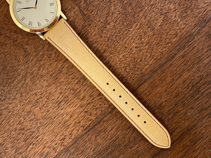 (1989) Seiko 5Y94-8000 dress watch - gold case - cream dial w/ black Roman numerals (NOS)