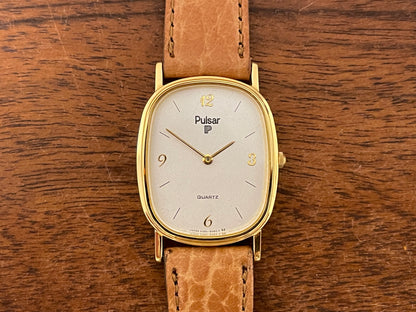 (1985) Pulsar V320-5029 "Ellipse" dress watch - gold case - diamond dust dial (NOS)