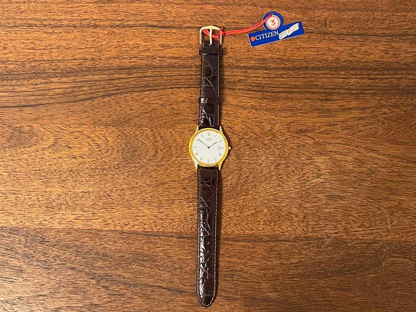 (1995) Citizen QF0838-05A Ore Felici dress watch - white dial w/ black Roman numerals (NOS)