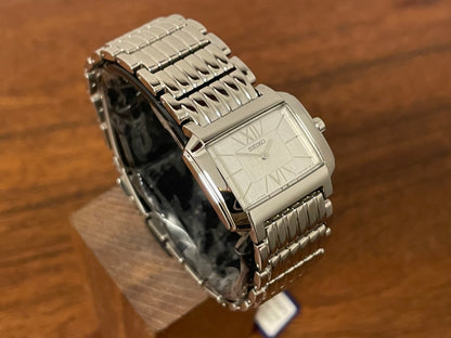 (1998) Seiko 1N00-0PT0 - rectangular case - silver dial w/ silver Roman numerals & markers - small size (NOS)