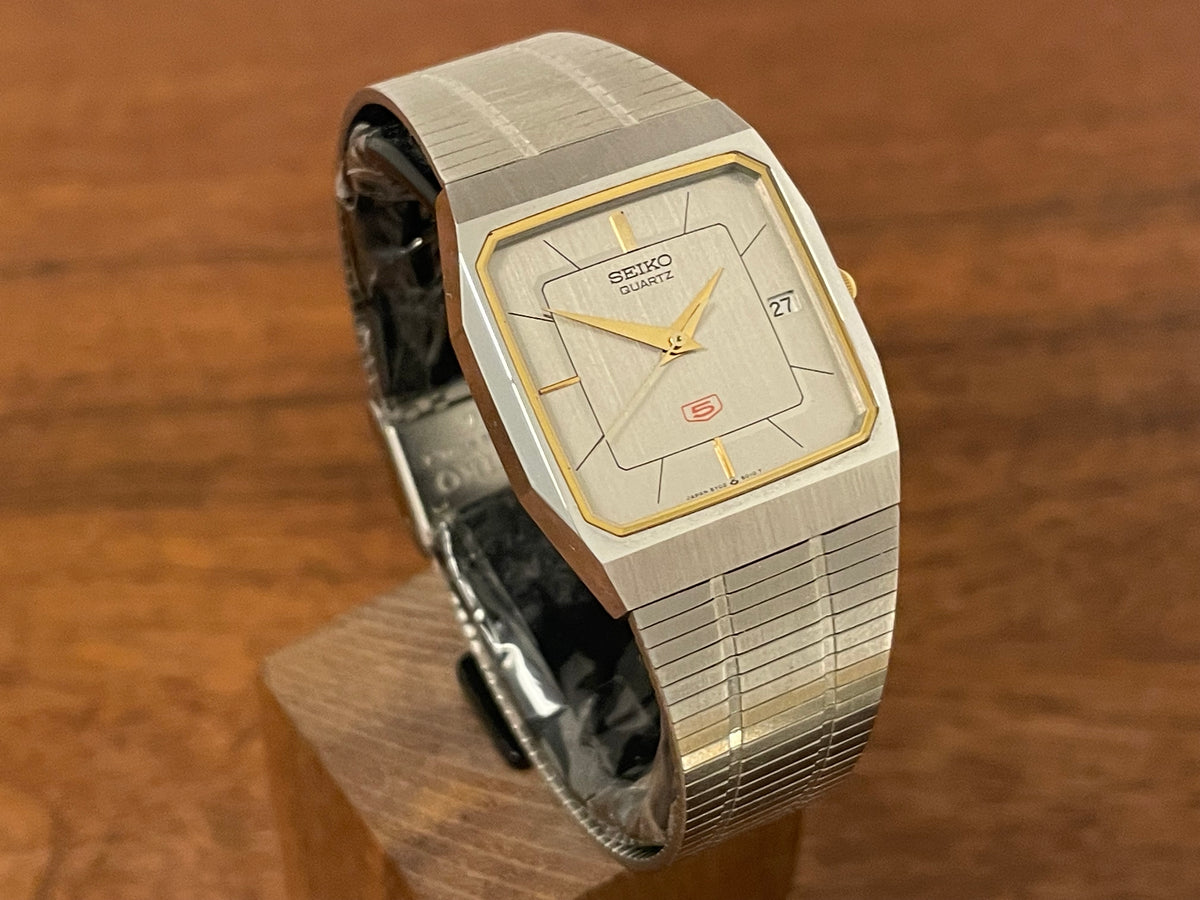 (1985) 5Y02-5010 Seiko 5 quartz - integrated bracelet - silver brushed dial w/ stick markers (mint)