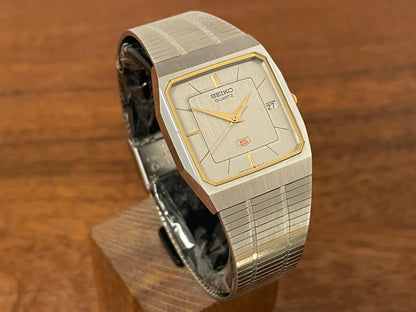 (1985) 5Y02-5010 Seiko 5 quartz - integrated bracelet - silver brushed dial w/ stick markers (mint)