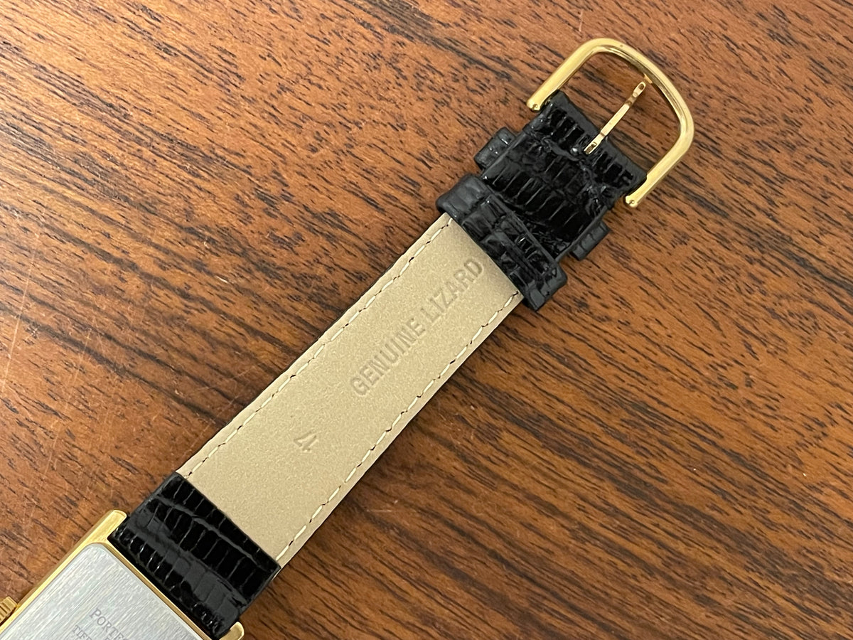 (1998) Tiffany & Co. Portfolio "Tank" dress watch - gold case - white dial w/ black Roman numerals (Mint)