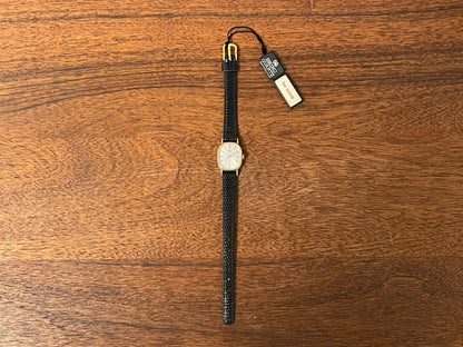(1981) Seiko 5420-5119 "Ellipse" - gold plated case - silver sunburst dial w/ gold markers - small size (NOS)
