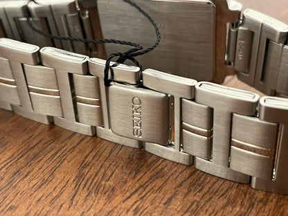 (1991) Seiko 7N01-5C90 - integrated bracelet - blue dial w/ silver markers (NOS)