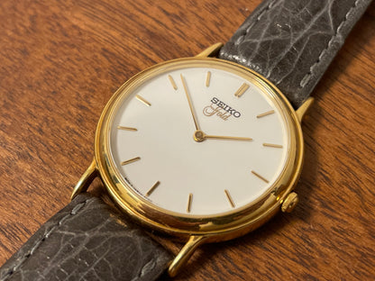 (1994) Seiko 7N00-S007 "Gold" 18K gold collection dress watch - 18k solid gold case - white dial w/ gold markers