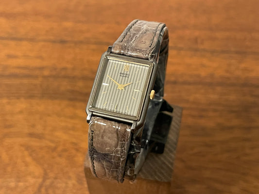 Front side (1985) 2C20-6230 "Tank" - grey case - silver striped "pyjama" dial w/ gold stick markers - small size (NOS)