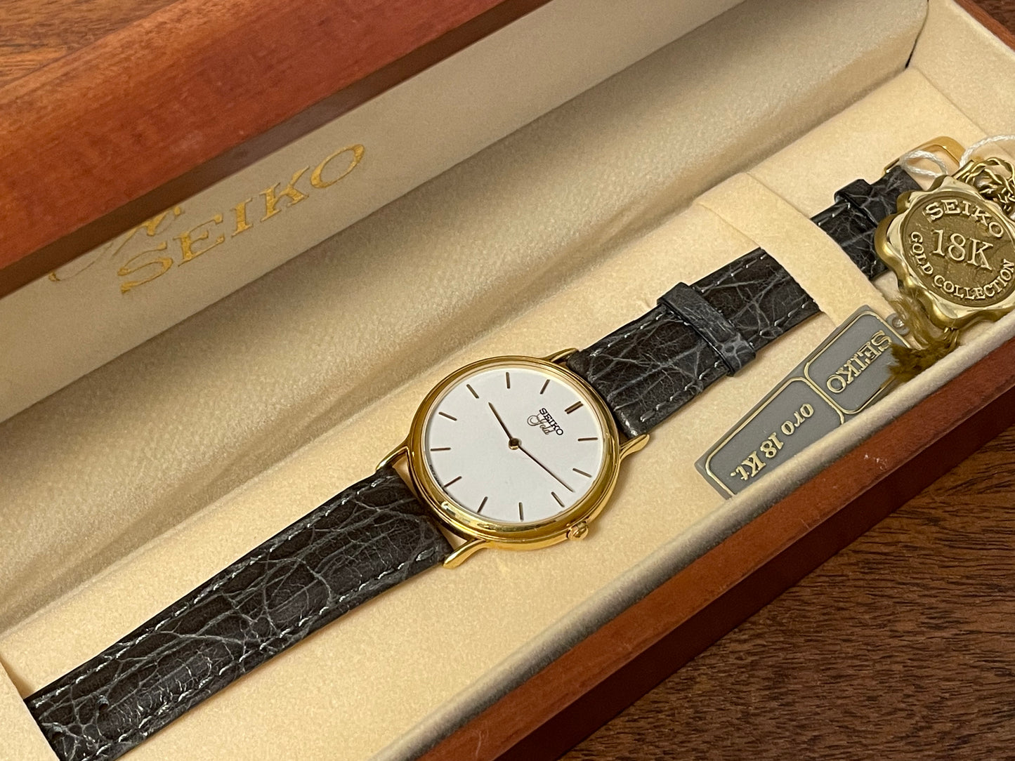 (1994) Seiko 7N00-S007 "Gold" 18K gold collection dress watch - 18k solid gold case - white dial w/ gold markers