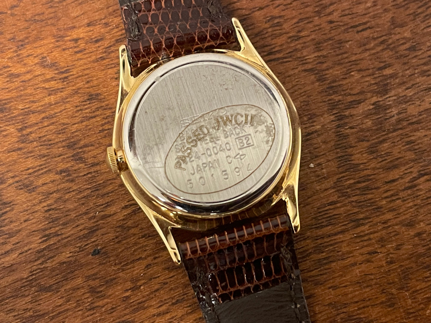 (1985) Seiko 2A24-0040 dress watch - champagne dial w/ moonphase & stick markers - small size (NOS)