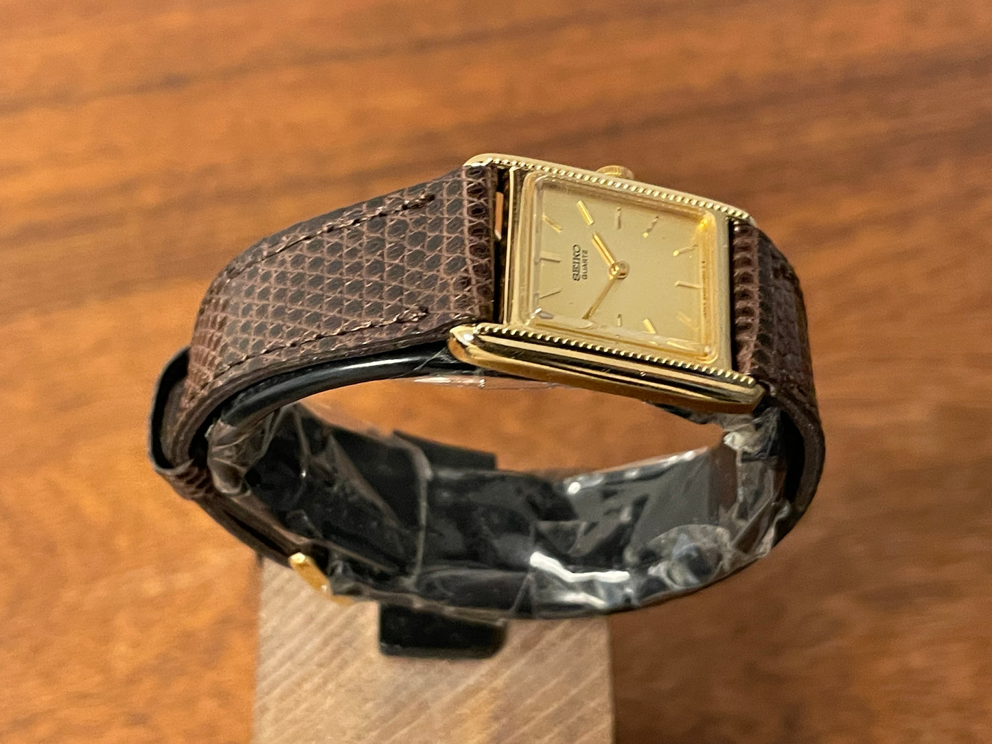 (1982) Seiko 5420-5100 "Tank" dress watch - brushed gold dial w/ gold markers - small size (NOS)